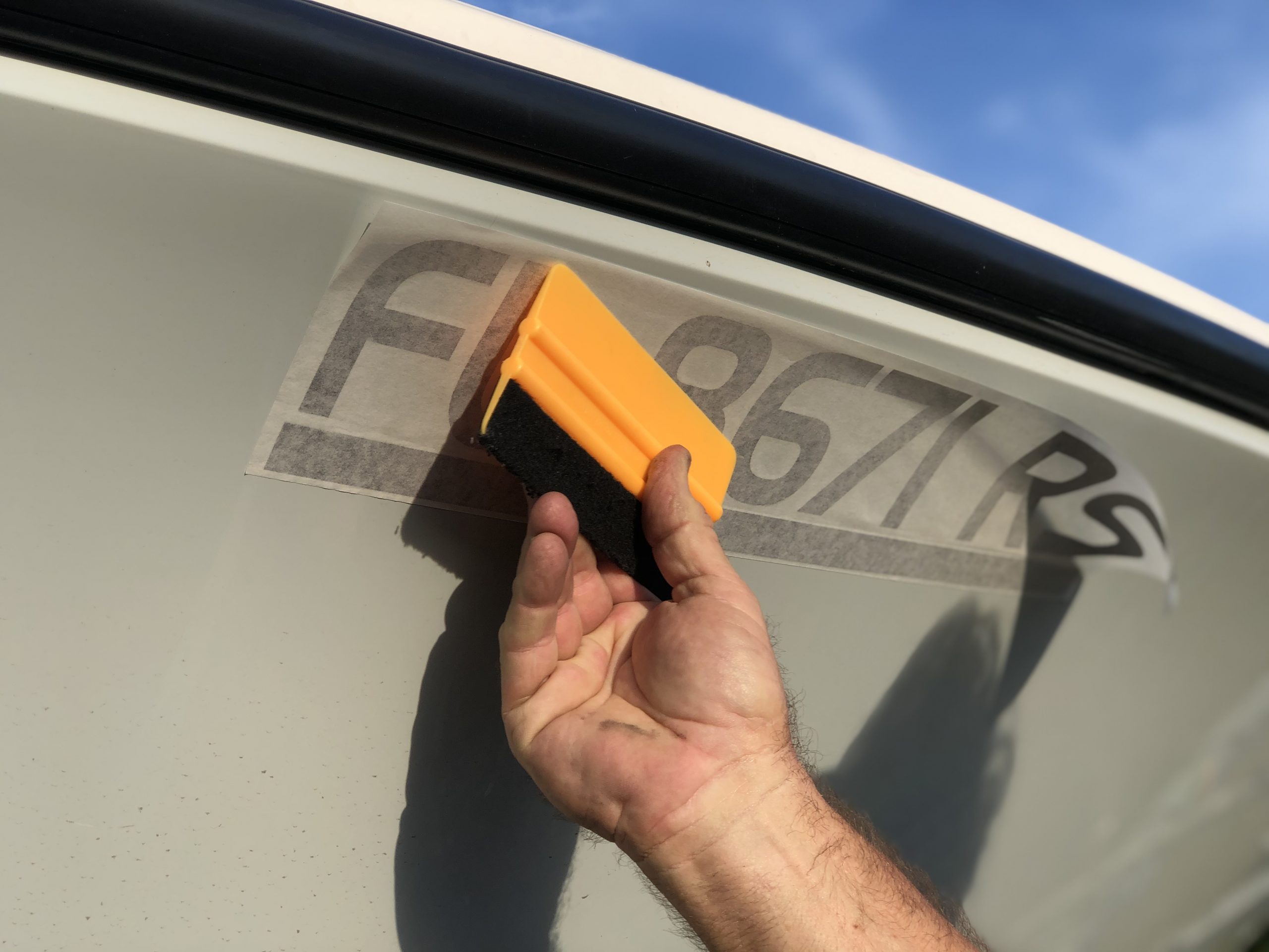 MarineReg squeegee affixing numbers